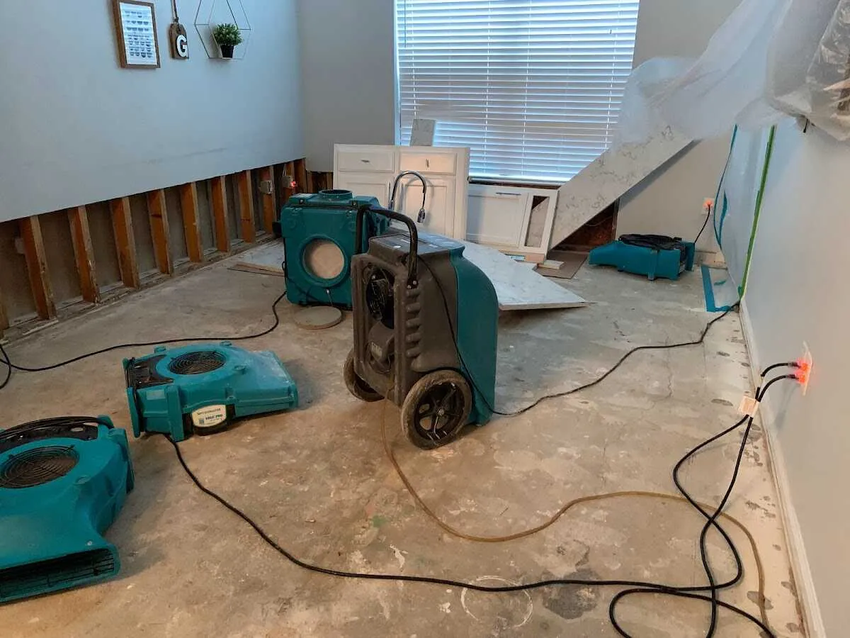 Dehumidifier in flood-cut room for Water Damage Restoration in Josephine